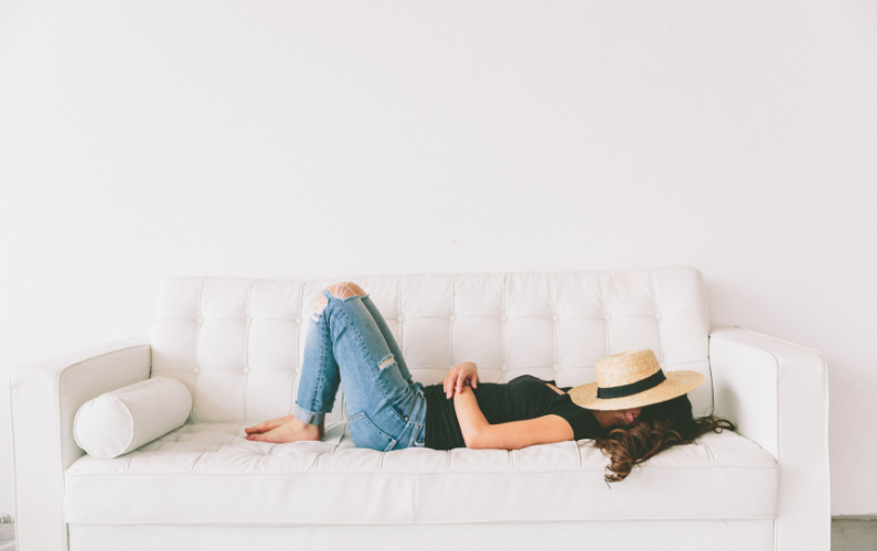 Woman relaxing on couch