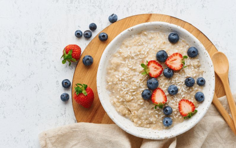 Bowl of oatmeal with blueberries and strawberries